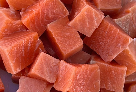 Fresh cut cubes of wild Alaska salmon